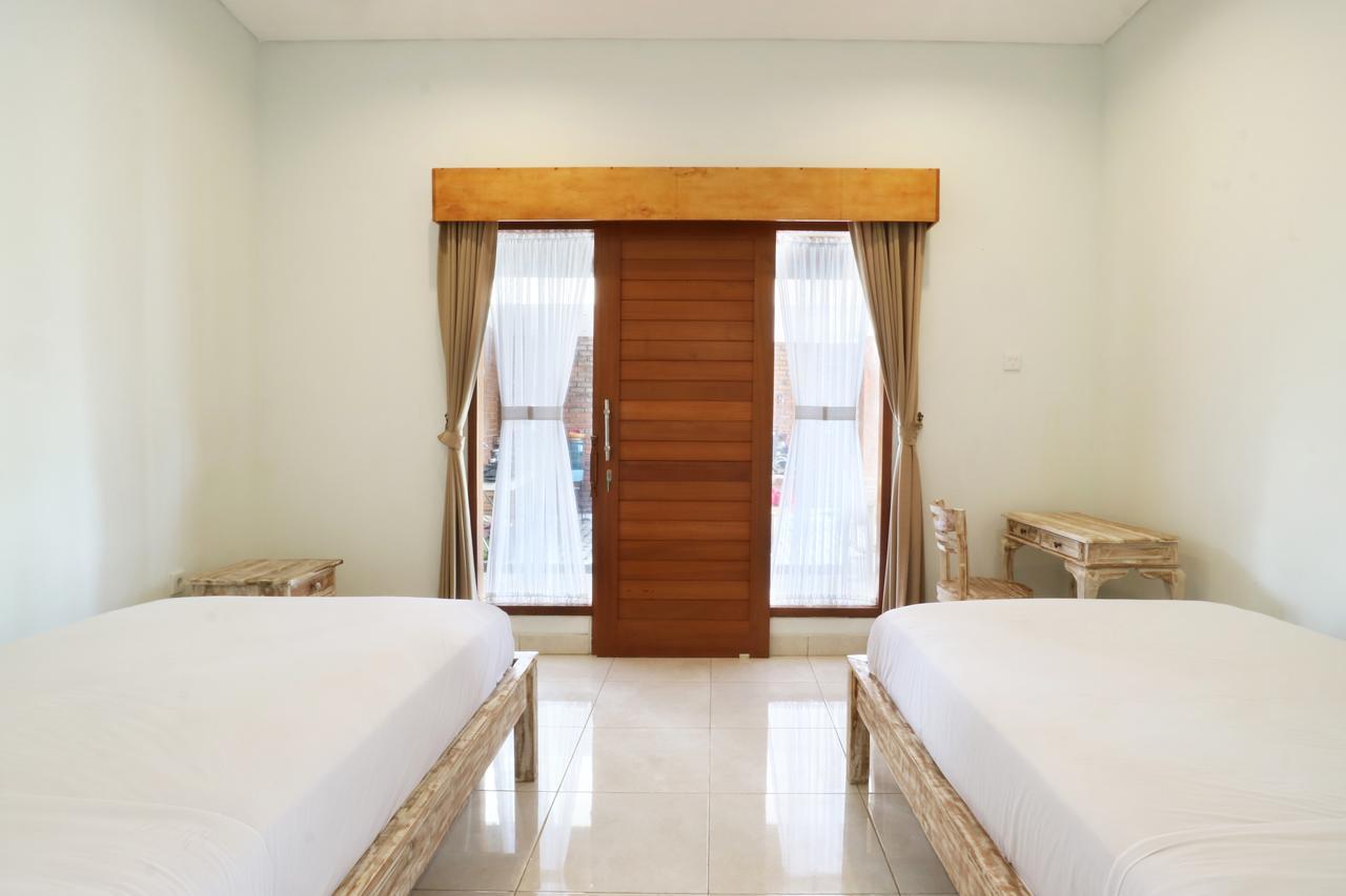 Aghasvina Guest House Canggu Buitenkant foto