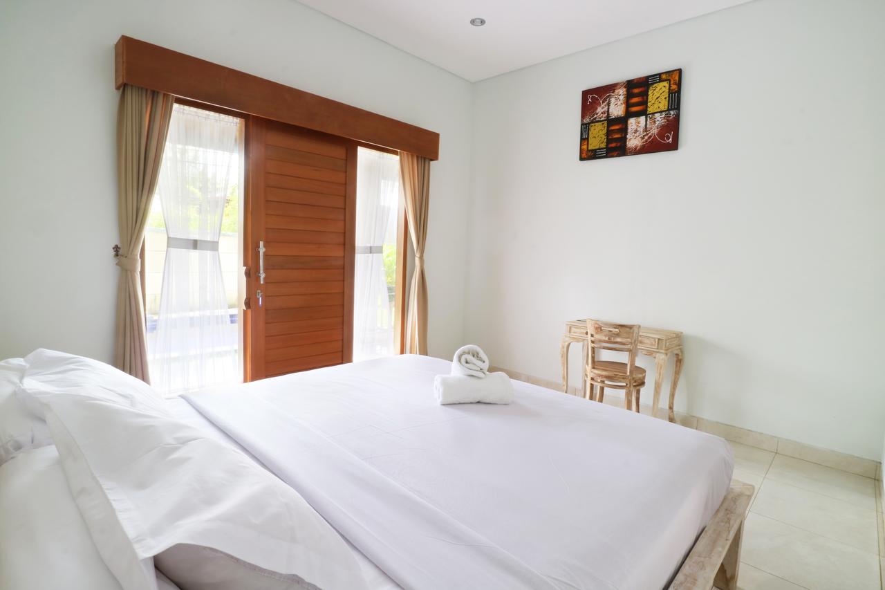 Aghasvina Guest House Canggu Buitenkant foto